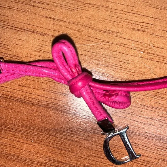 Authentic Christian Dior Leather and Metal Charm Bow Bracelet - Picture 9 of 11